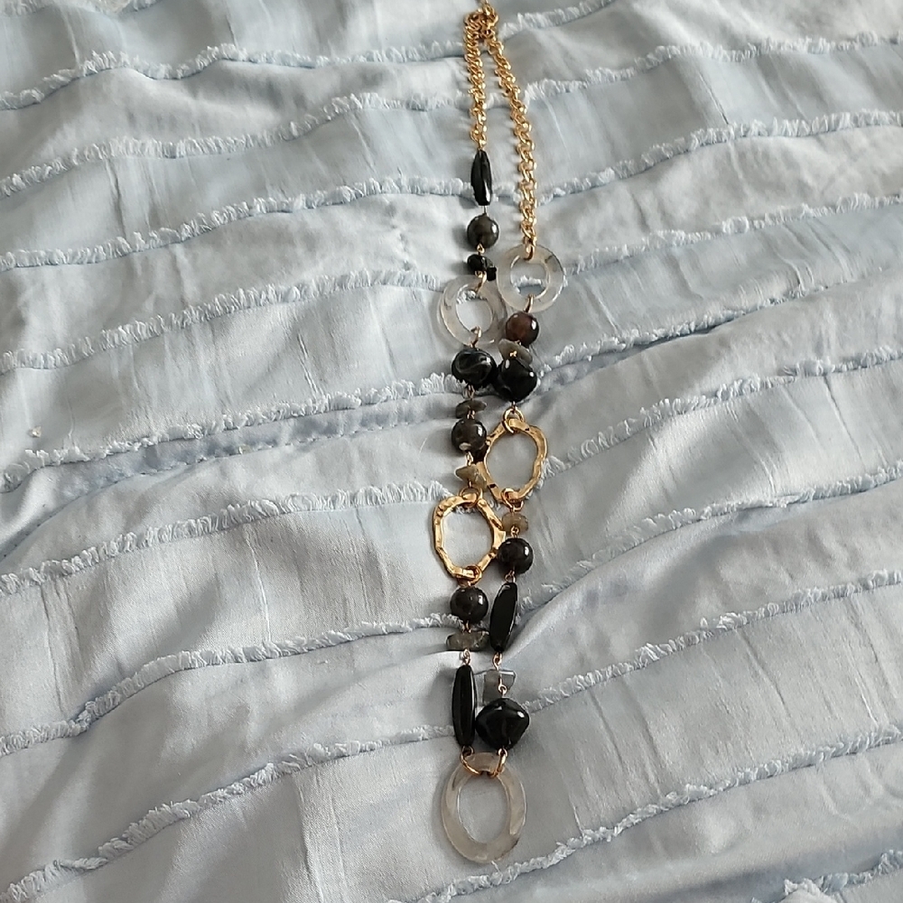 Black and Gold Beaded Necklace with Circular Pendant